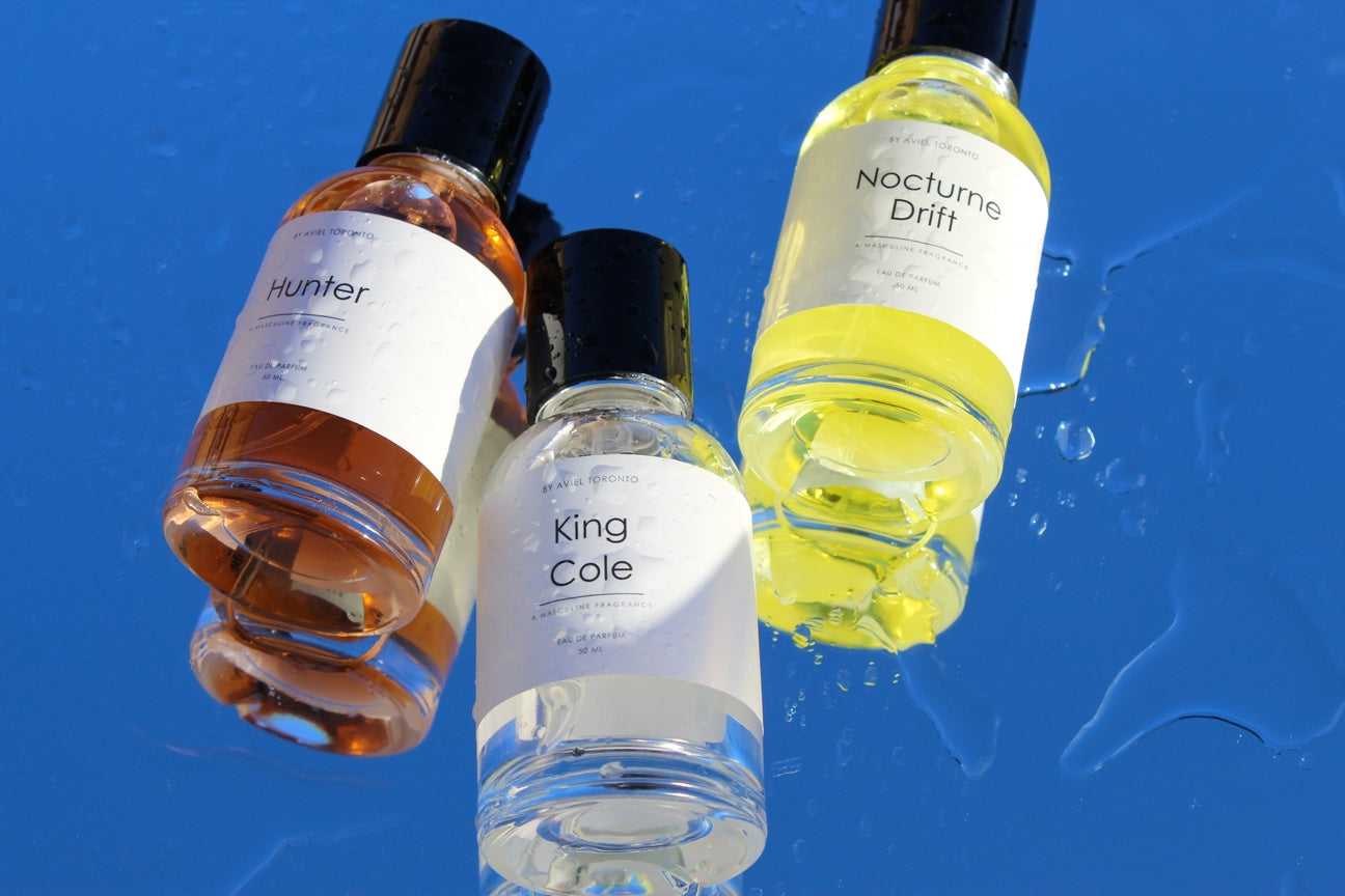 Aviel Toronto oil-based fragrances displayed in minimalist, eco-friendly packaging, highlighting sustainable fragrances and long-lasting perfume oils; premium unisex scents designed for clean beauty lovers searching for natural, artisan perfumes.